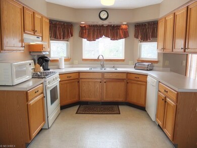 Spacious kitchen with lots of cabinet space.