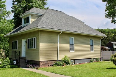 Side View With Freshly Painted Base Of Home and Ne