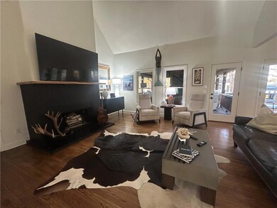 LARGE LIVING/FAMILY ROOM LEADING TO SUNROOM