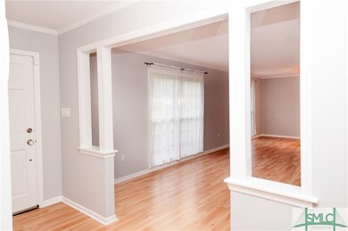 Foyer entrance to formal living and dining to the 