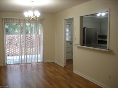 Dinning Room with lots of light and opened up to the kitchen.