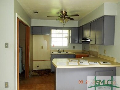 Kitchen from Dining Area.  Note peninsula breakfas