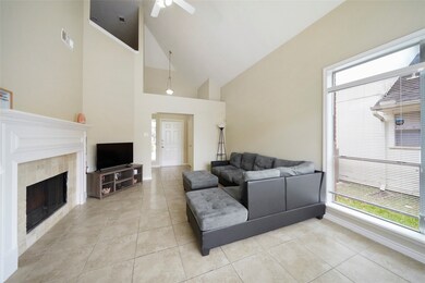 This spacious family room features a romantic wood burning fireplace with tile surround and a classic wood mantle. What a great spot to cozy up by the fire and unwind.