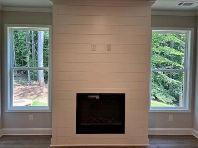 Modern fireplace with shiplap detail