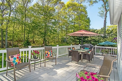 This back deck overlooks the private back yard.  I