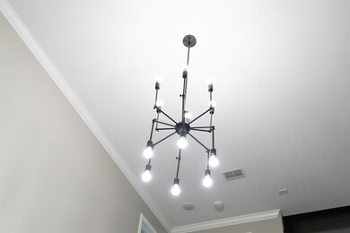 The modern sputnik-style ceiling light fixture wit