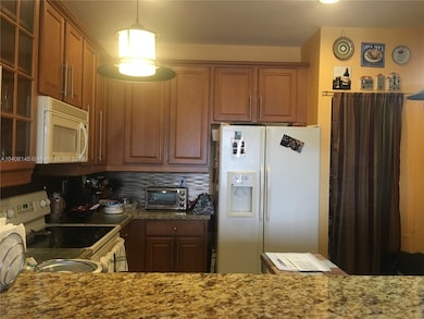 Open kitchen granite counter top and plenty of spa