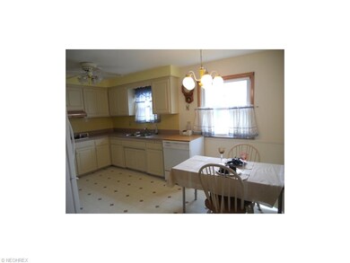 Eat-in Kitchen with Loads of Cabinets and All Appl