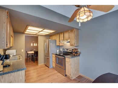 New kitchen countertops, stainless stove, fan hood