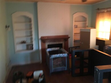 Living area featuring wood finished floors