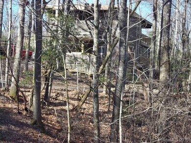 NESTLED IN THE WOODS