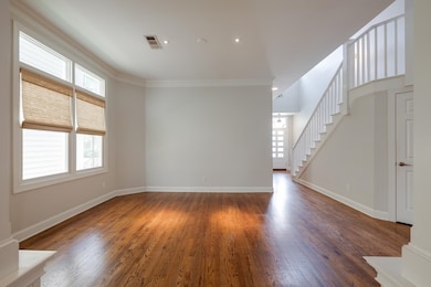 Unfurnished living room featuring healthy amount o