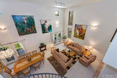 View from second level balcony of living room and 
