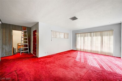 Front door, closet, and living room