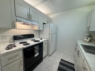 13450 SW 3rd St unit D209, Pembroke Pines, FL 33027 - photo 3