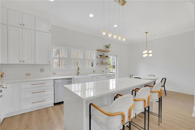 Photos are of the model home; actual finishes may vary but are of similar quality.