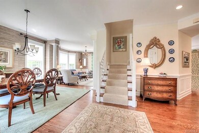 Foyer view of Dining Room and Living Room.