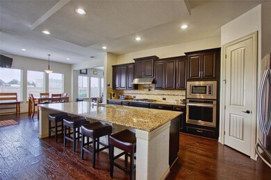 Spacious kitchen w/oversized island.