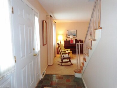 Entering into the front door onto the tiled foyer.