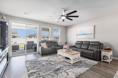 Entrance to property featuring a porch and a balcony