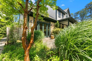 Many varieties of mature plantings adorn the property