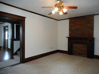 Living Room. Original wood work