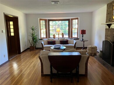 Large living room with Pella Bay window great for 