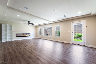 Unfurnished living room featuring dark wood-style