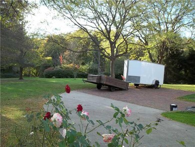 Yard/Garden. CONCRETE DRIVE AND BRICK AREA FOR PAR