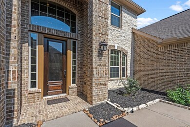The elegant front entrance makes a stately first impression.