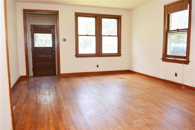 Bright and Inviting Living Room with Hard Wood Flo