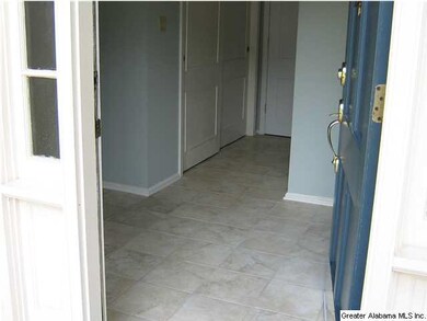 The foyer has a very nice tile floor