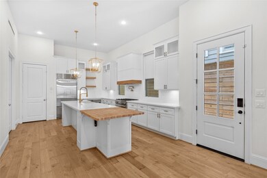 The kitchen offers plenty of storage for any kitch