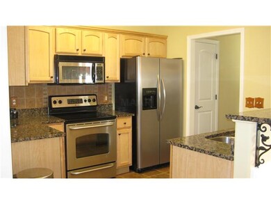 Another view of the kitchen.