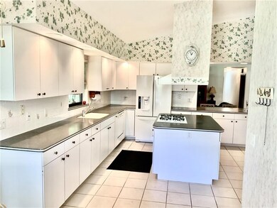 Looking into kitchen area from breakfast nook.