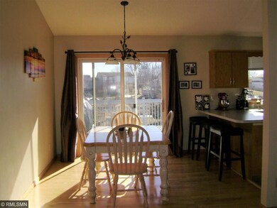 Great dining room with patio door to large deck ov