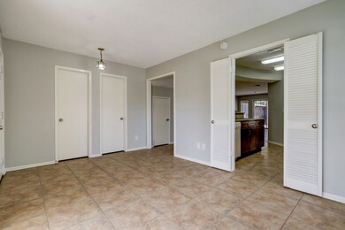 Shutter doors separate front room from galley kitchen!