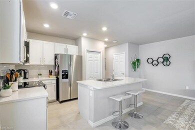 Beautiful kitchen with newly installed tile backsp