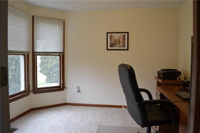 First floor den off family room with walk-in bay w
