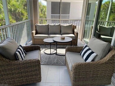 Sunroom featuring an outdoor hangout area