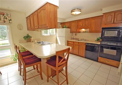 Lots of oak cabinetry and a large counter area tha