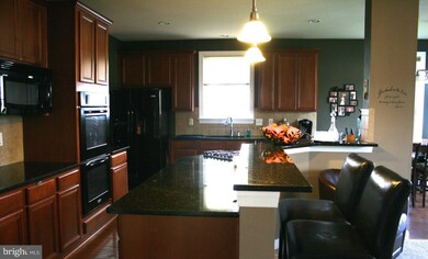 10902 Clara Barton Dr, Bristow, VA 20136 - photo 7