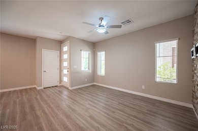 Empty room featuring wood finished floors and ceil