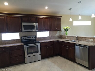 Newly renovated kitchen with new appliances and granite counter tops.