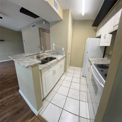 New countertops highlight this open kitchen.