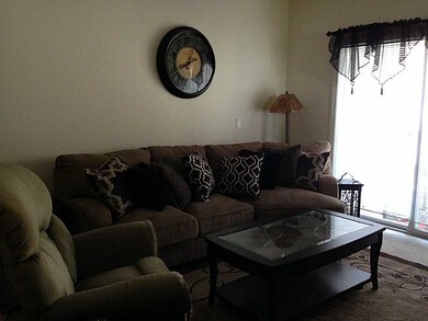 Exterior Front. Living Room/Slider to balcony