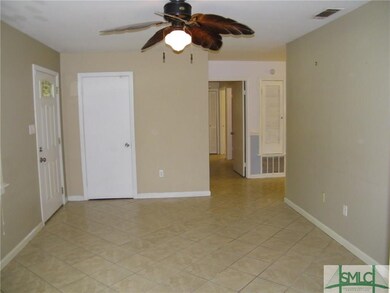 Living room looking from den