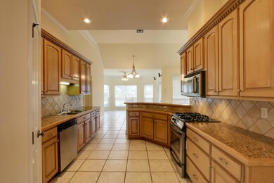 Stainless Steel appliances. This photo looks acros