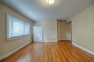 First Fl bedroom or use as a living room. Plenty of natural light. Approx. size 13'x13'.