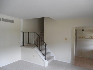 Stairs to 2nd floor in living room